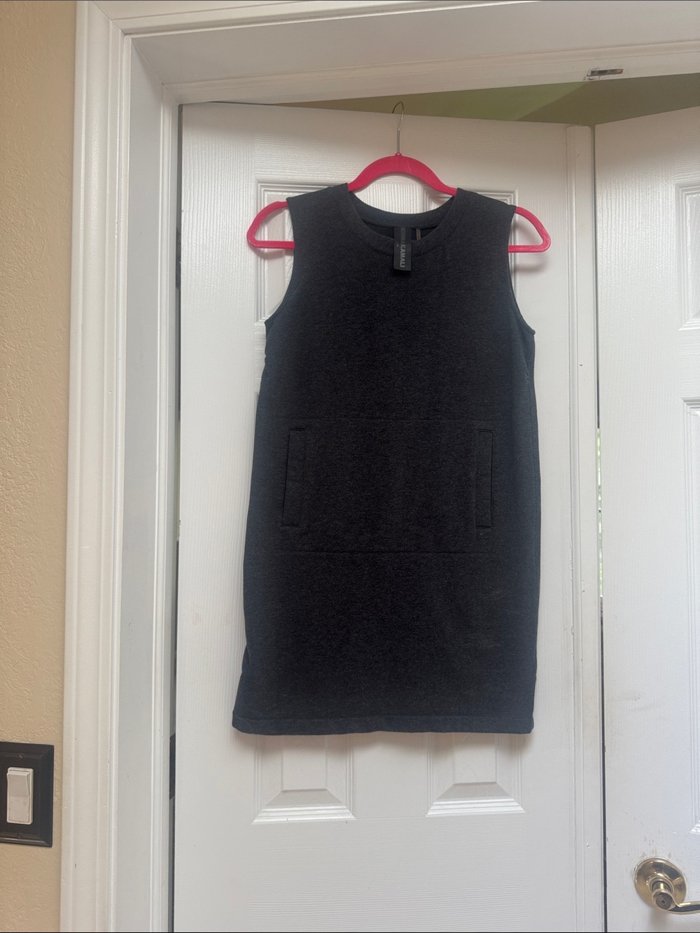 Norma Kamali Sleeveless Black Shift Dress with Front Pocket